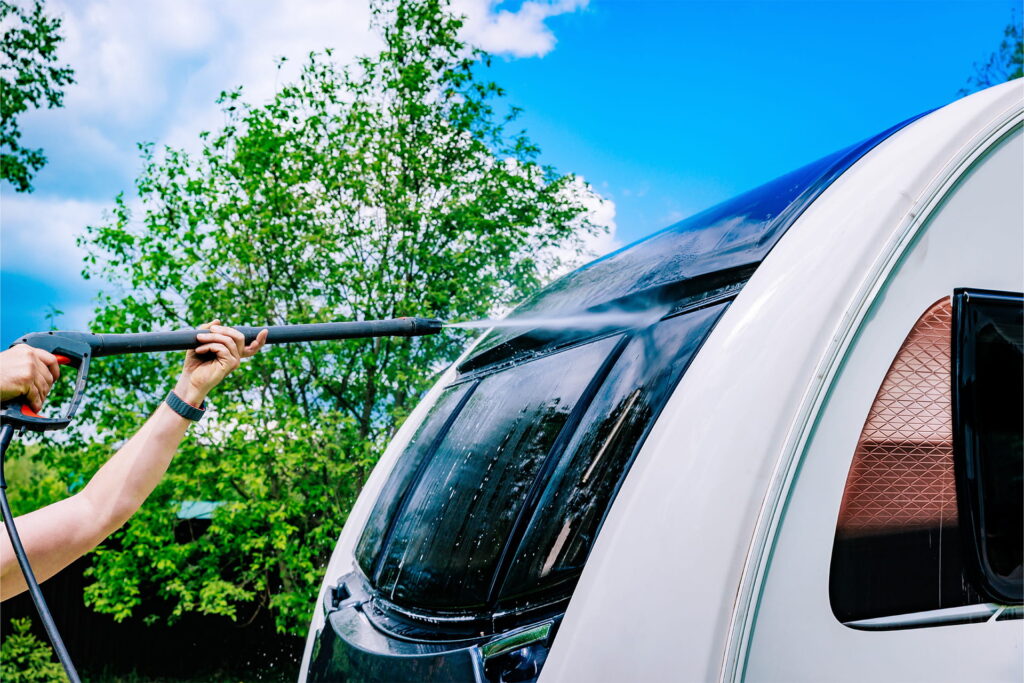 Pressure washing the roof of a caravan before winter storage